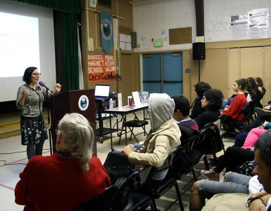 Writer, indie rocker and director Cecil Castellucci visited Daniel Pearl Magnet High School on  Thursday afternoon to give a presentation to students. Her presentation consisted of her life as a writer and how music inspires her as she writes her novels. Photo by Rusel Ramirez