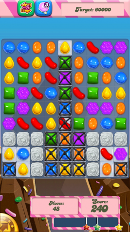 Screenshot by Ilana Gale In the app Candy Crush, the player swipes the candy to match three in a row, which causes them to disappear.