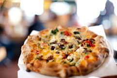 Pitfire offers delicious pizza. Photo from pitfirepizza.com.