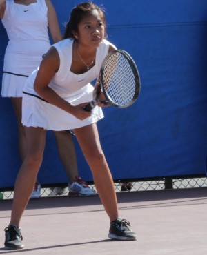 Varsity player Elyssa Gorospe prepares for her opponent's serve during a game.  Photo by Jake Dobbs