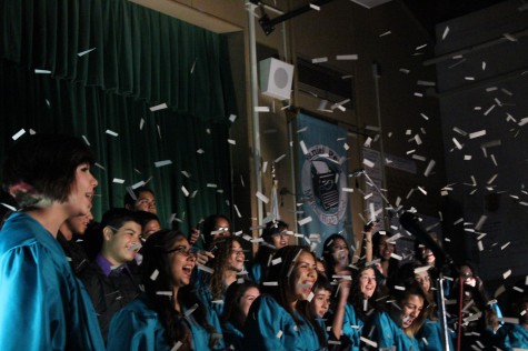 Confetti falls down on the choir during one of their performances. Photo by Jake Dobbs.