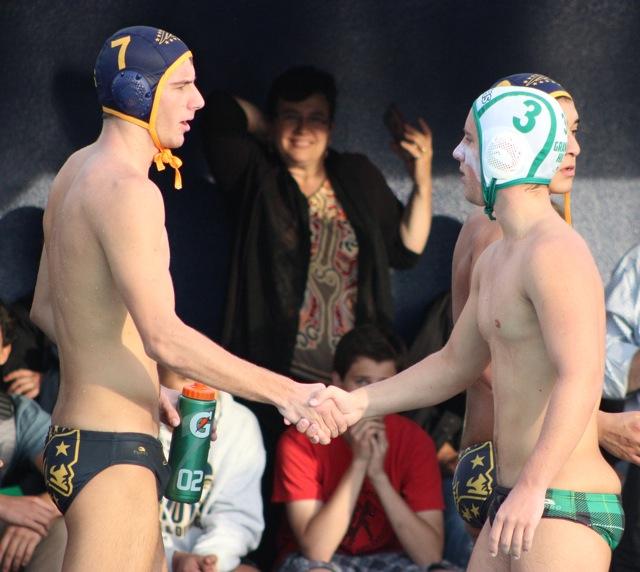 Senior Anthony Dracic (No.7) shakes hands with his opponent from Granada Hills Community Charter High School on Thursday.