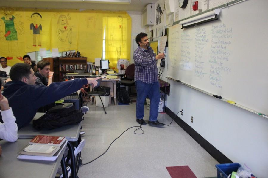 Author Neal Shusterman gives a presentation on writing during a workshop third period today. Students in the 11th grade English class wrote a short story with Shusterman.