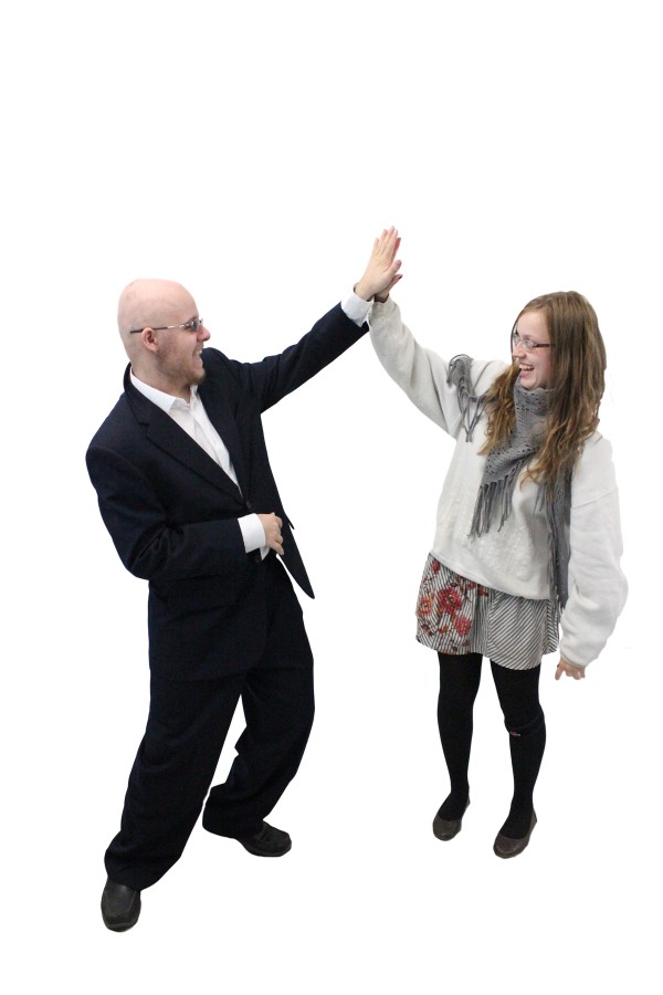 Photo by Jake Dobbs
Christopher Bower and Meagan Ford high five to celebrate getting their commending letter given to them by the school for the National Merit Scholarship.