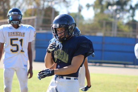 Junior Stanley Cea practices under the sun at Birmingham Community Charter High School’s field with his fellow teammates as they prepare for playoffs to begin. The Patriots were able to make it to playoffs.  They defeated Banning High School 30-36 on Nov. 21and were able to play in the quarterfinals before losing to Garfield.