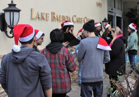 Music teacher Jackie Gorski and choir prepare to sing carols at the Lake Balboa Care Center.