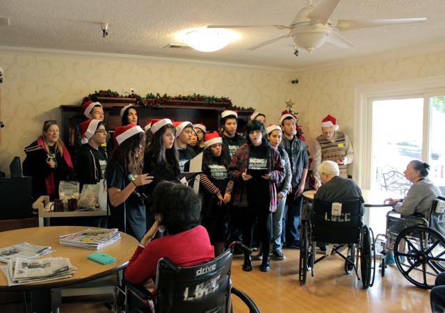 The choir sings holiday songs to the elderly at the Lake Balboa Care Center.