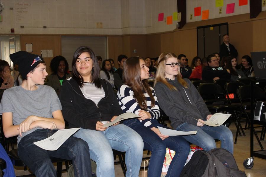 Freshmen Owen Duffy, Jessica Salguero, Ani Kocharyan and Alice Curran sit at the Clemens House award ceremony on Friday with their awards. Friday was the last day of the fall semester. 
