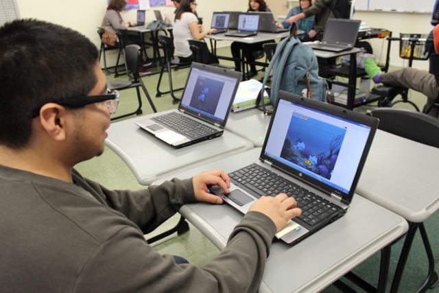 Senior Julio Leal has some fun during Arcade day in Computer Science, where the students took the day to play each others games, designed using a program called Scratch.