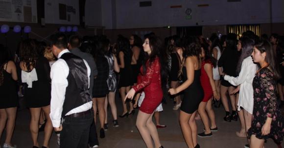 Students enjoy the Black and White Dance while dancing the famous ChaCha Slide.