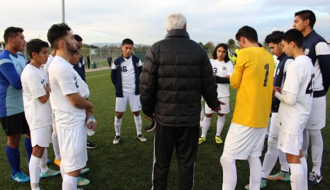 The boys varsity soccer team gathers to raise moral as the members prepare for a home game against Granada Hills Charter High School on Jan. 30 in Balboa Park. 