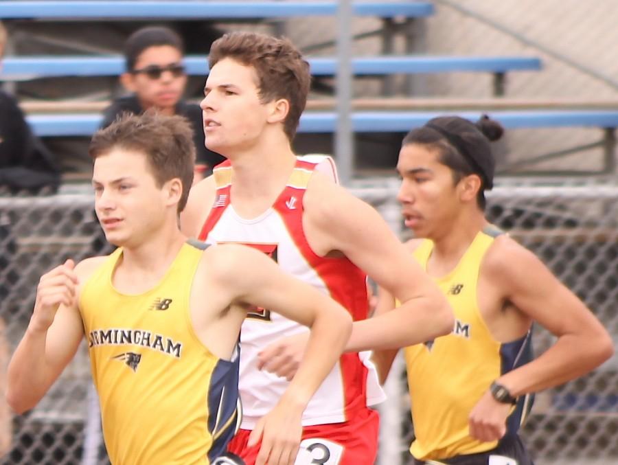 Sophomore John Ford runs on Taft Charter High Schools track on April 22 during a track meet.