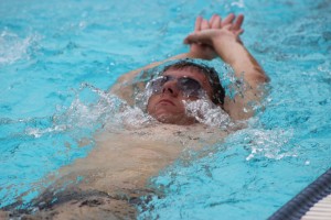 Swimmer Anthony Dracic preforms his backstroke at BCCHS' swimming pool.