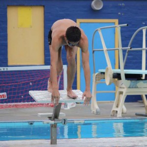 Swimmer Maxim Grinfeld prepares to dive into BCCHS swimming pool.  