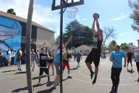 Senior Jeremy James, goes up to make the shot during Fiesta Friday. Where first ever senior vs staff basketball game was played. (file photo)