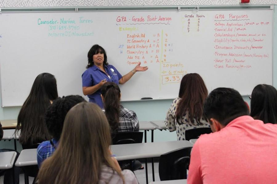 Counselor Martina Torres teaches current DPMHS families about grade point averages (GPA) during student orientation in August. Torres explained how GPAs are calculated and how students can make the honor roll.