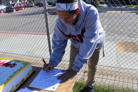 Varsity soccer player Hailey Pohevitz participates in a mock signing at BCCHS on Feb.2. 