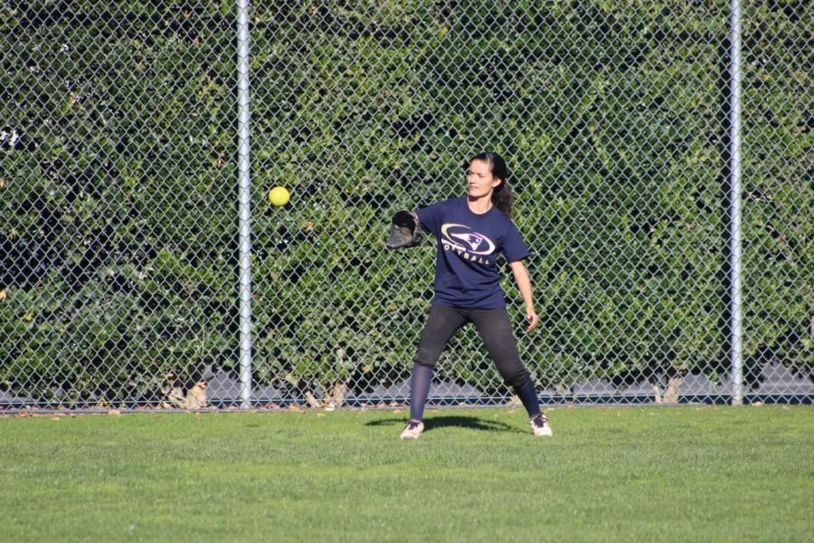 Freshman Genevieve Avalos positions herself to catch the ball. Avalos is the first freshman on varsity.