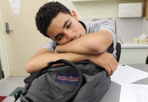 Senior Chris Pina falls asleep during third period in Cynthia Barry’s English class. Students of Daniel Pearl Magnet High School battle the exhaustion daily due to lack of sleep. 