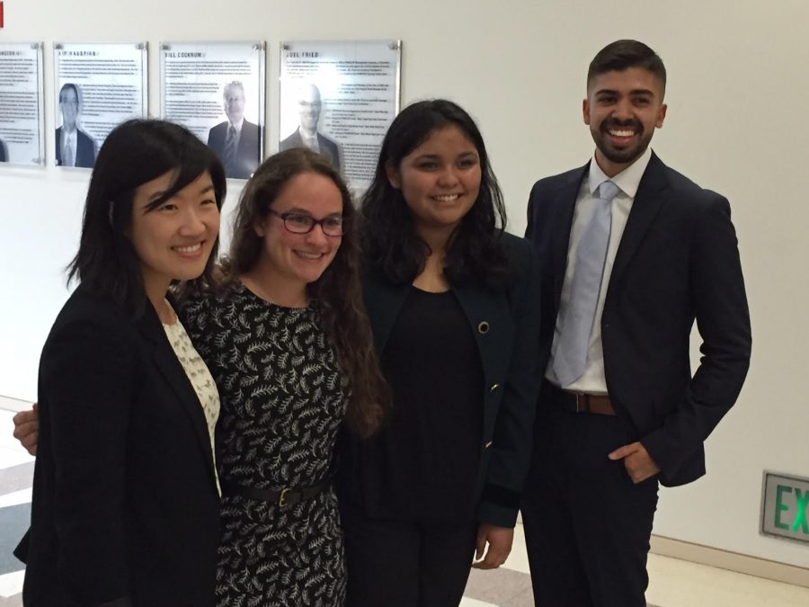 Online Editor-in-Chief Rebekah Spector and Sports Editor Elsie Morales stand with two UCLA students during their private interview. 