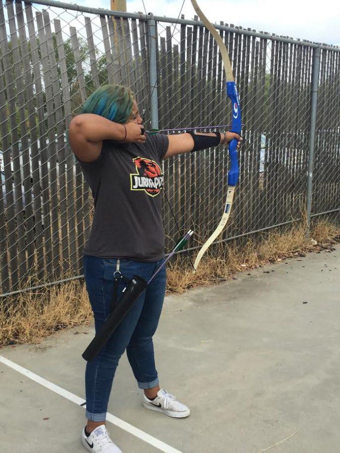 Senior Genesis Ocampo practices her bow in arrow at the Woodley Park Range on Sept. 5. 