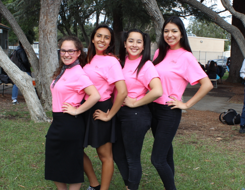Seniors Rebekah Spector, April Serrano, Andrea Escamilla, and Crystal Betancourt dress up as the Pink Ladies from Grease.