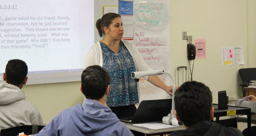 Teacher of the year nominee Leah Pevar teaches to her english class about context clues. Pevar has been part of the Shark family for two years now.