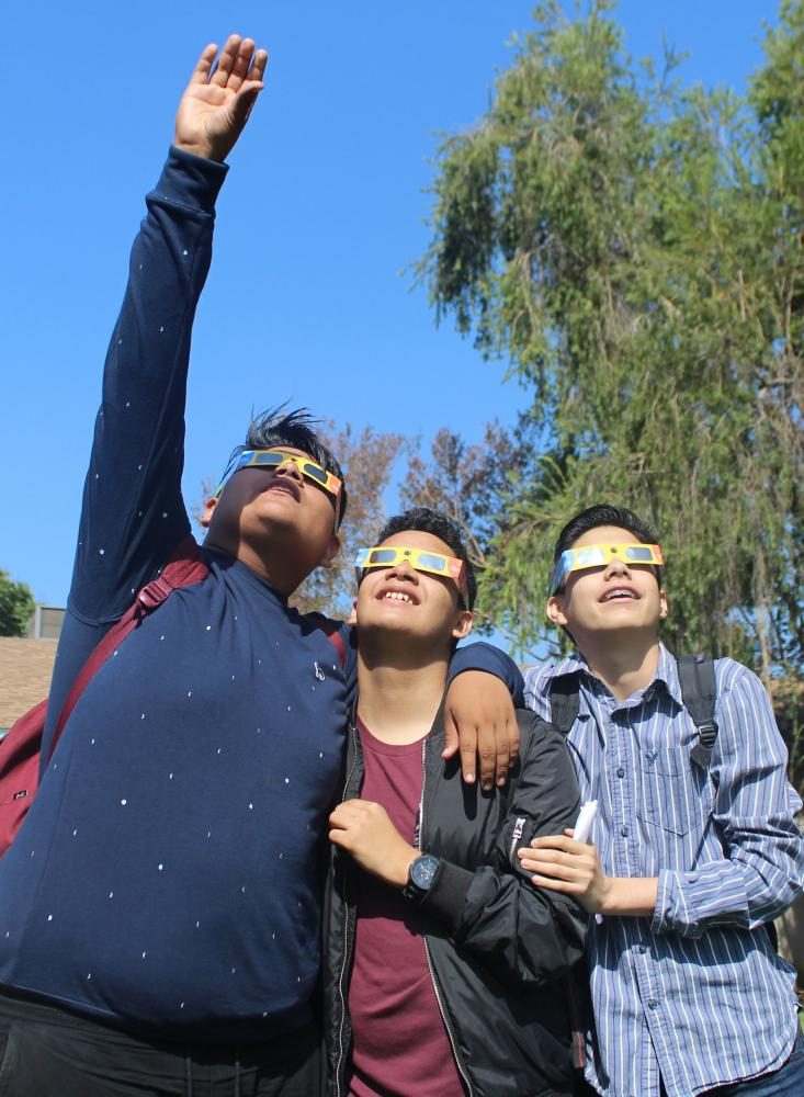 Students turned in permission slips in order to view the eclipse, with many joining their friends in The Grove in front of school on Aug. 21, 2017.