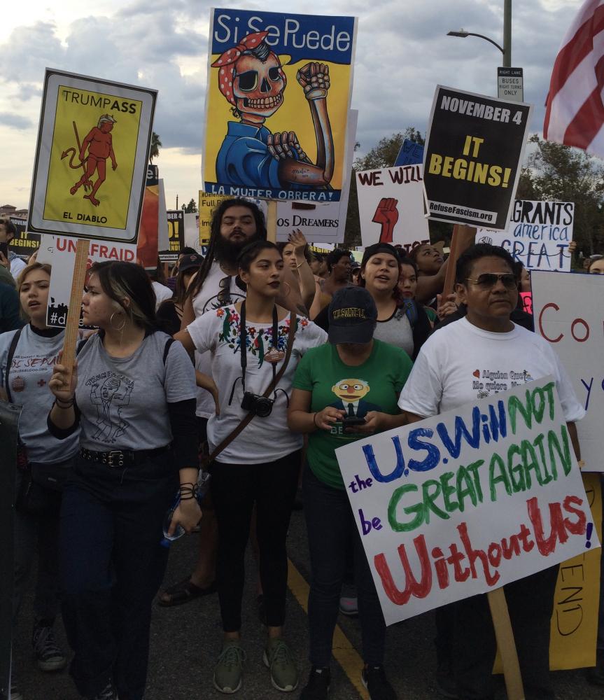 Protestors show their support for undocumented people at a DACA rally and march. 