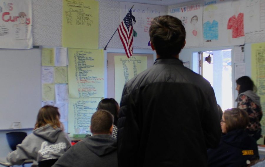 During the morning Pledge of Allegiance, many students students across di erent classrooms choose to not stand, leaving up to only two students per class standing alone.