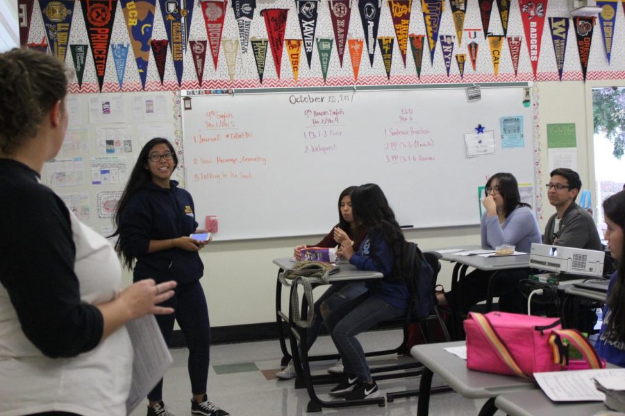 Junior Astrid Cabrera leads the first National Honors Society Club meeting with club sponsor Leah Pevar in Room 15.