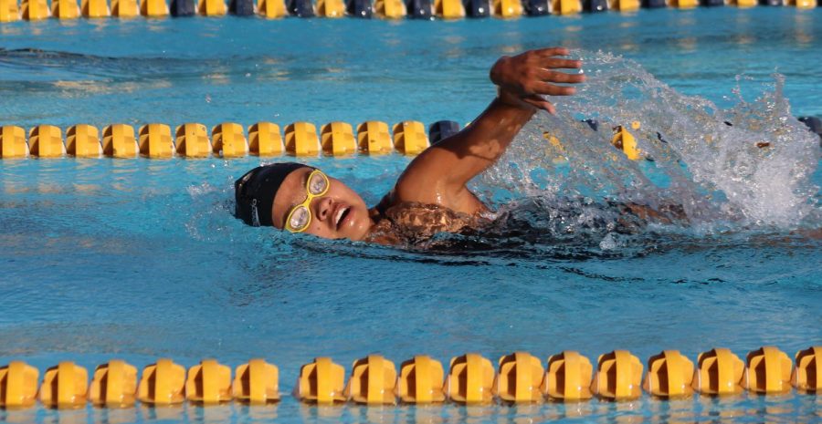 Freshman Julissa Jaco competes in the J.V. Girls 100 freestyle during the team’s  first swim meet at Birmingham Charter High School.