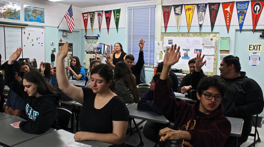 Students in history teacher Davy Mauermann’s first period Advanced Placement United States Government and Politics class vote for a winner in the Supreme Court case debate. The winner advances in the Supreme Court Case March Madness bracket.