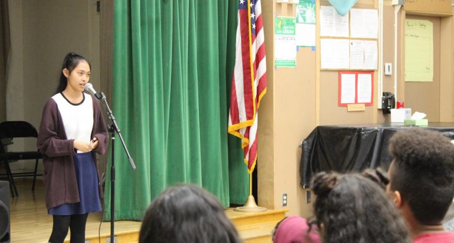 Get Lit players sophomore Andionne Mendoza recites a poems during the April 12 Poetry Slam assembly. 