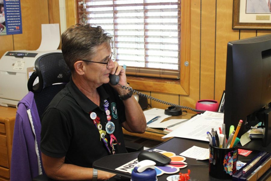 Principal Deb Smith takes a phone call during school. This year will be Smiths last year as she plans to retire.