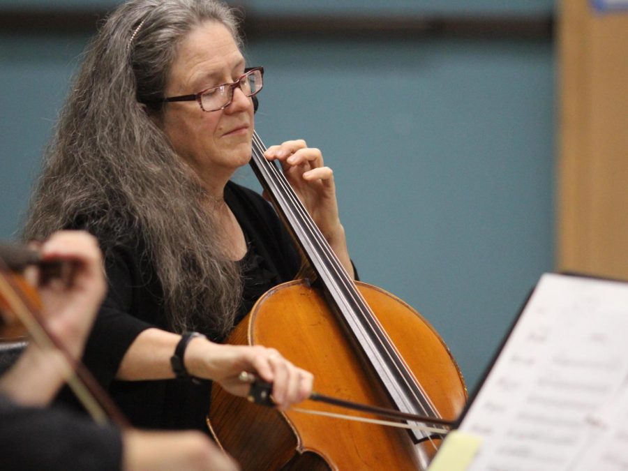 Kadima String Quartet member Lynn Angebranndt plays the cello for the song Despacito by Luis Fonsi during the performance on Oct. 8