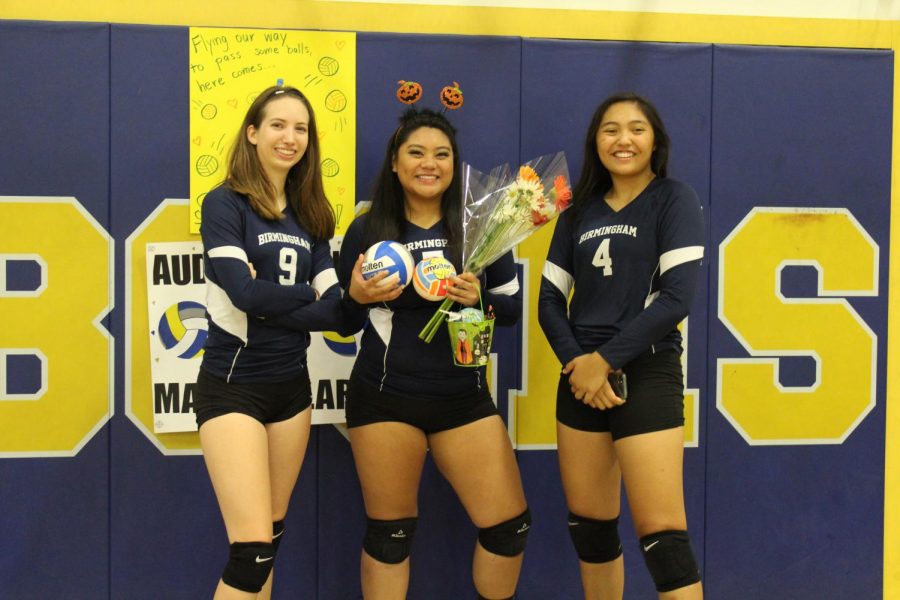  Varsity volleyball captain Hailee Kessler poses with her fellow Lady Patriots Audree Alaras and Keona Paniagua after their home game against the Toreadors October 11.