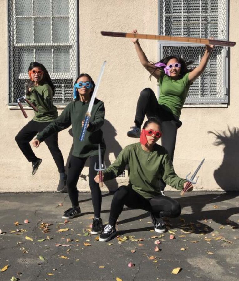 Alyanna Ahorro, Lucianne Lejarde, Kimberly DeDios and Keona Paniagua dress up as the Ninja Turtles for Halloween.