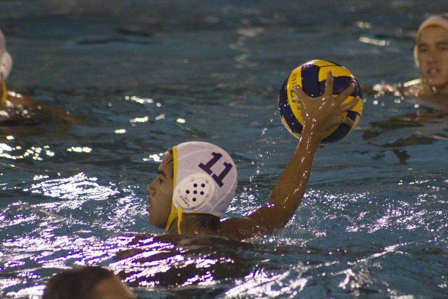 Driver CJ Gorospe passes the ball to his teammate during the CIF City Championship game on Nov. 8 at Los Angeles Valley College.