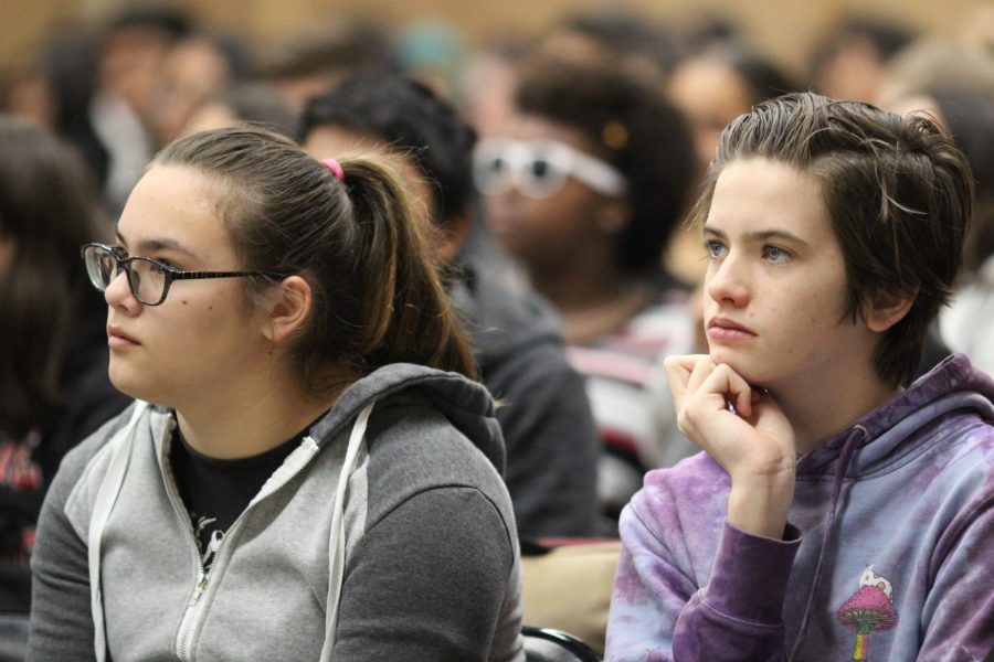 Freshmen Danielle Haiwongse and Quinn Thorpe pay close attention at the Change the Talk assembly during 2nd period on Feb. 22. 