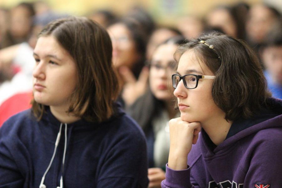 Sophomore Samantha Mills and freshman Lauren Mills focus at the Change the Talk assembly during 2nd period on Feb. 22.