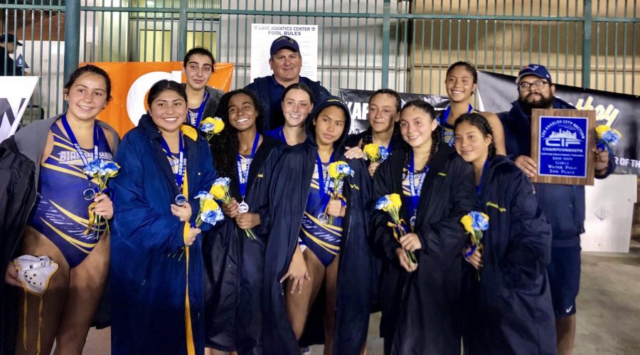 Birmingham girls varsity water polo pose with their trophies after placing second in CIF at Los Angeles Valley College on Feb. 14.