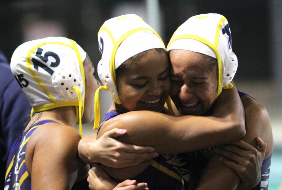 Varsity players Julissa Jaco and Annabella Powell embrace each other after winning the City Championship game against Palisades High School on Feb. 20. The Lady Patriots won with a score of 16-17. 