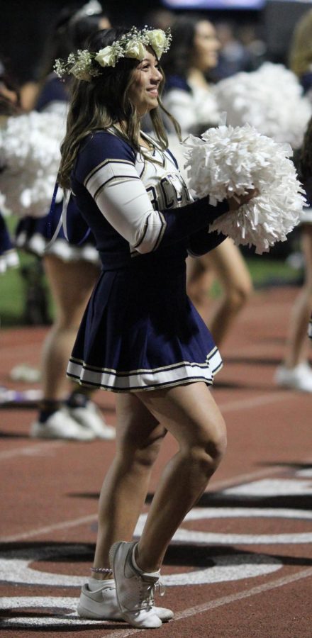 Sophomore Eden Grace Kolber performs with the cheerleading team during the Birmingham Community Charter High School Homecoming football game against Granada Hills Charter High School on Nov. 1.