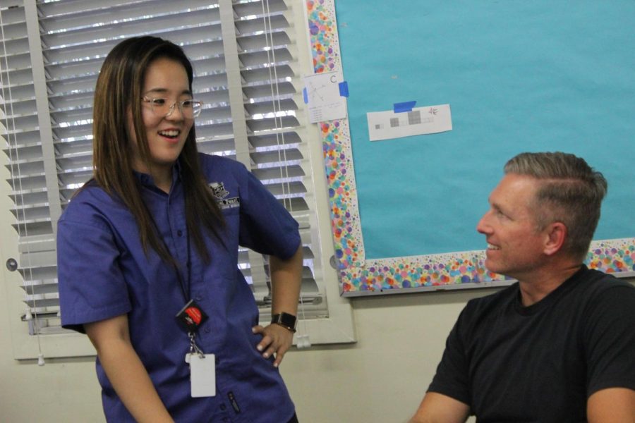 Math teacher Lori Seo greets parents at Back to School night on Sept. 12