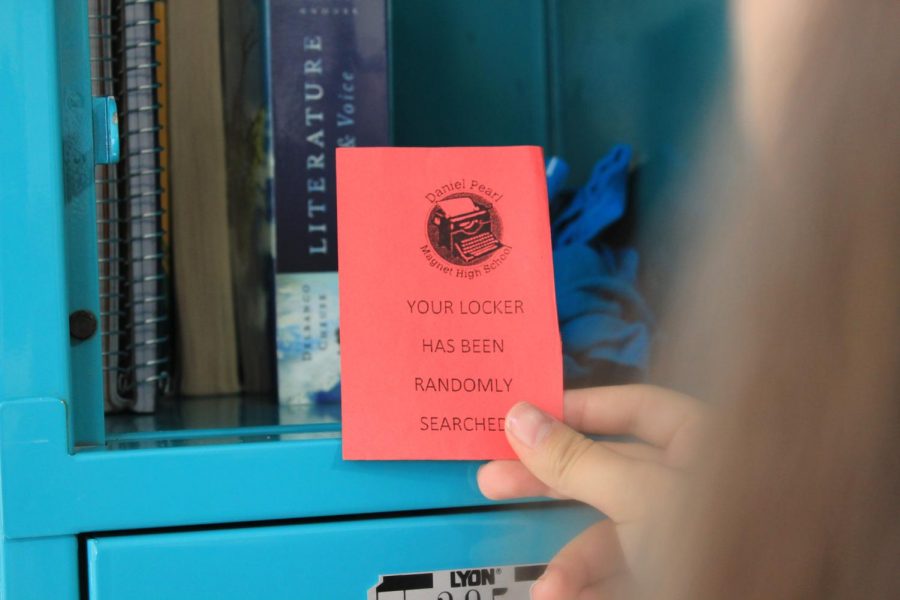 A bright red notice was left in a locker after it was randomly checked by faculty on campus. This is a part of the LAUSD random search policy that occurs daily at Daniel Pearl Magnet High School.