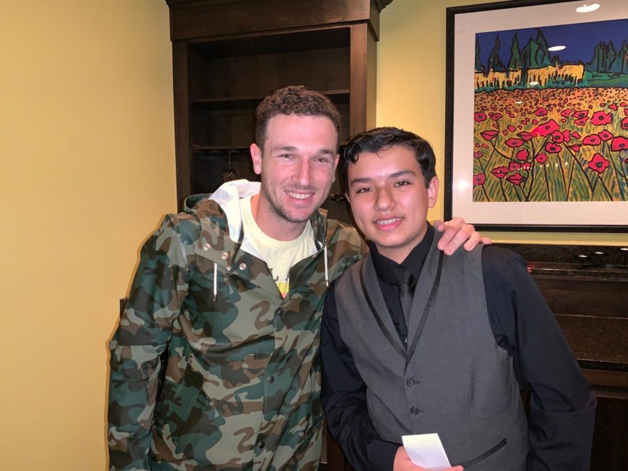 Houston Astros third baseman Alex Bregman smiles and takes a picture with his cousin freshman Collin DeOliveira.