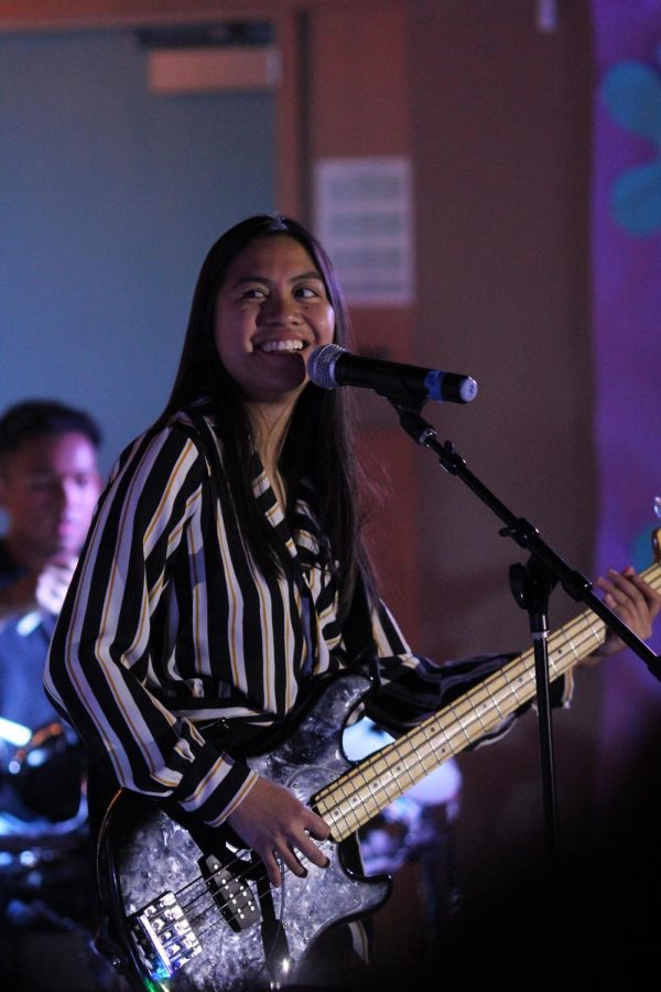 Senior Kim De Dios performs "1999" by Prince during Daniel Pearl World Music Day on Oct. 28.