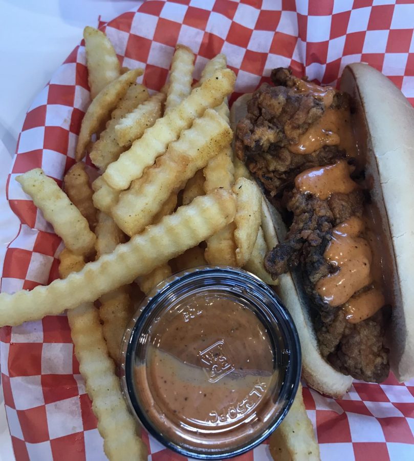 The Kluckin Chicken sells their classic chicken sandwich with their Klucking sauce and crinkle-cut fries. 