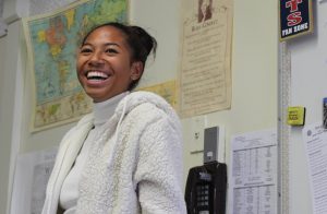 Black Student Union President Cassia Ramelb laughs at a joke made by a BSU club member during a meeting. 